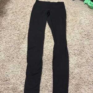 Women’s Lululemon black leggings size 4